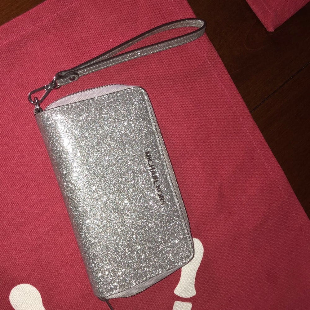 Michael Kor’s clutch/ wallet